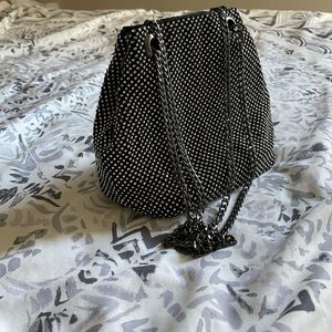 small black handbag with a unique look for special occasions!